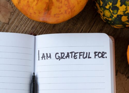 i,am,grateful,for,,handwriting,in,notebook,with,pumpkin,and