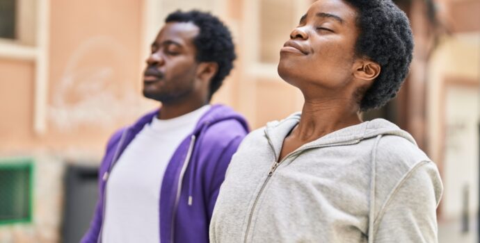african,american,man,and,woman,couple,breathing,at,street