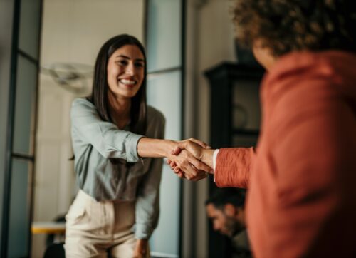 business,people,shaking,hands,in,the,office.,business,persons,handshaking