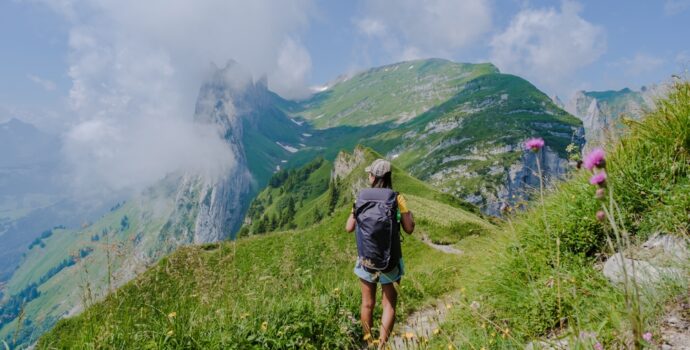 asian,women,hiking,in,the,swiss,alps,mountains,during,summer asian,women,hiking,in,the,swiss,alps,mountains,during,summer