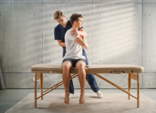 newsletter format (670 x 420 px) (1) professional,sport,physiotherapist,working,on,specific,muscle,groups,and,back