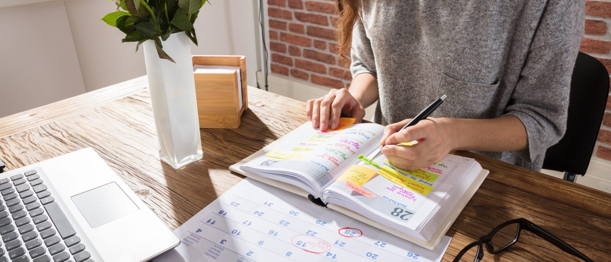 close up,of,a,businesswoman,making,agenda,on,personal,organizer,at close up,of,a,businesswoman,making,agenda,on,personal,organizer,at